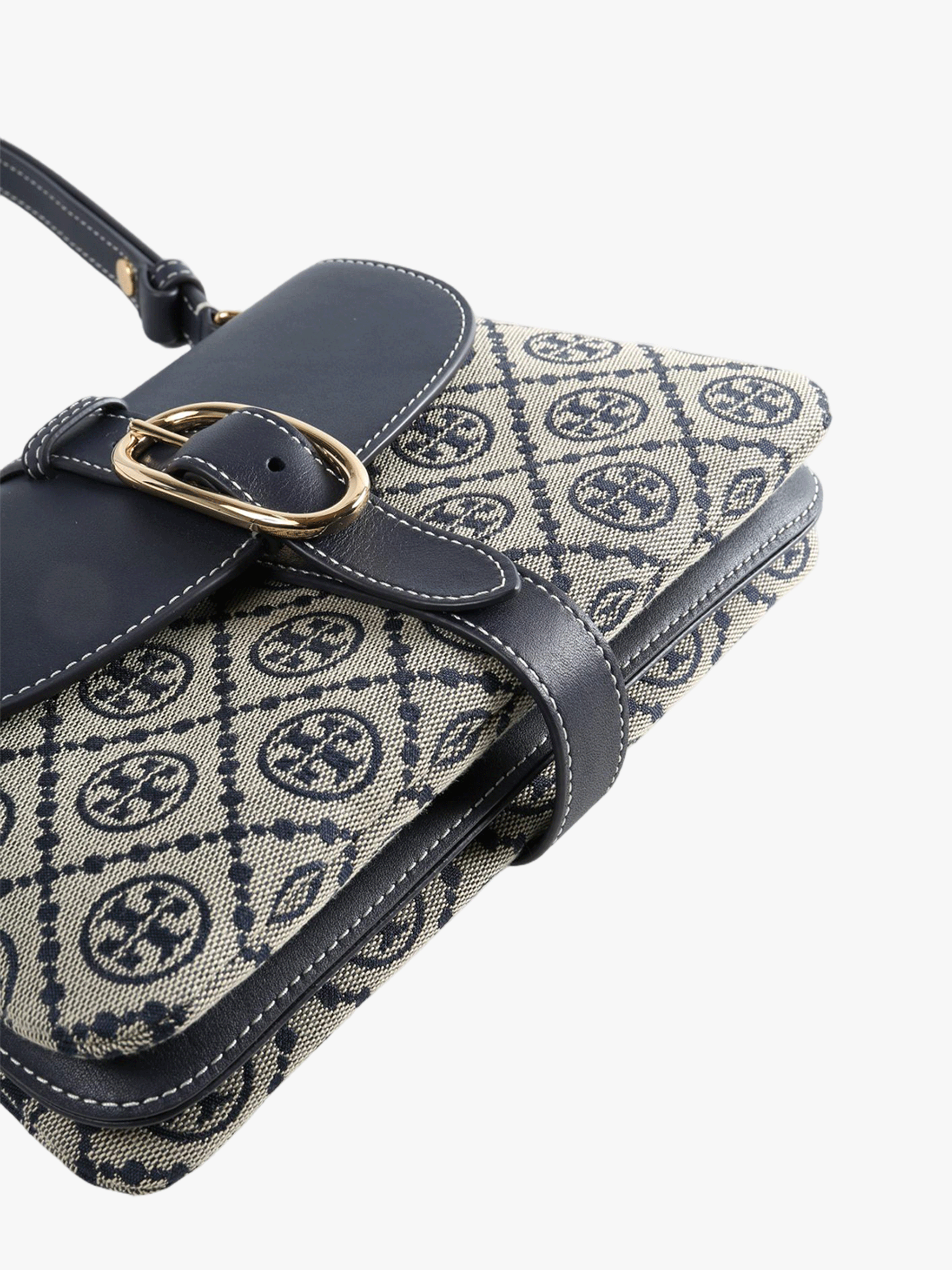 Close up of navy bags, showing texture of the fabric