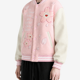 Pink jacket worn by a person, showing the jacket fit