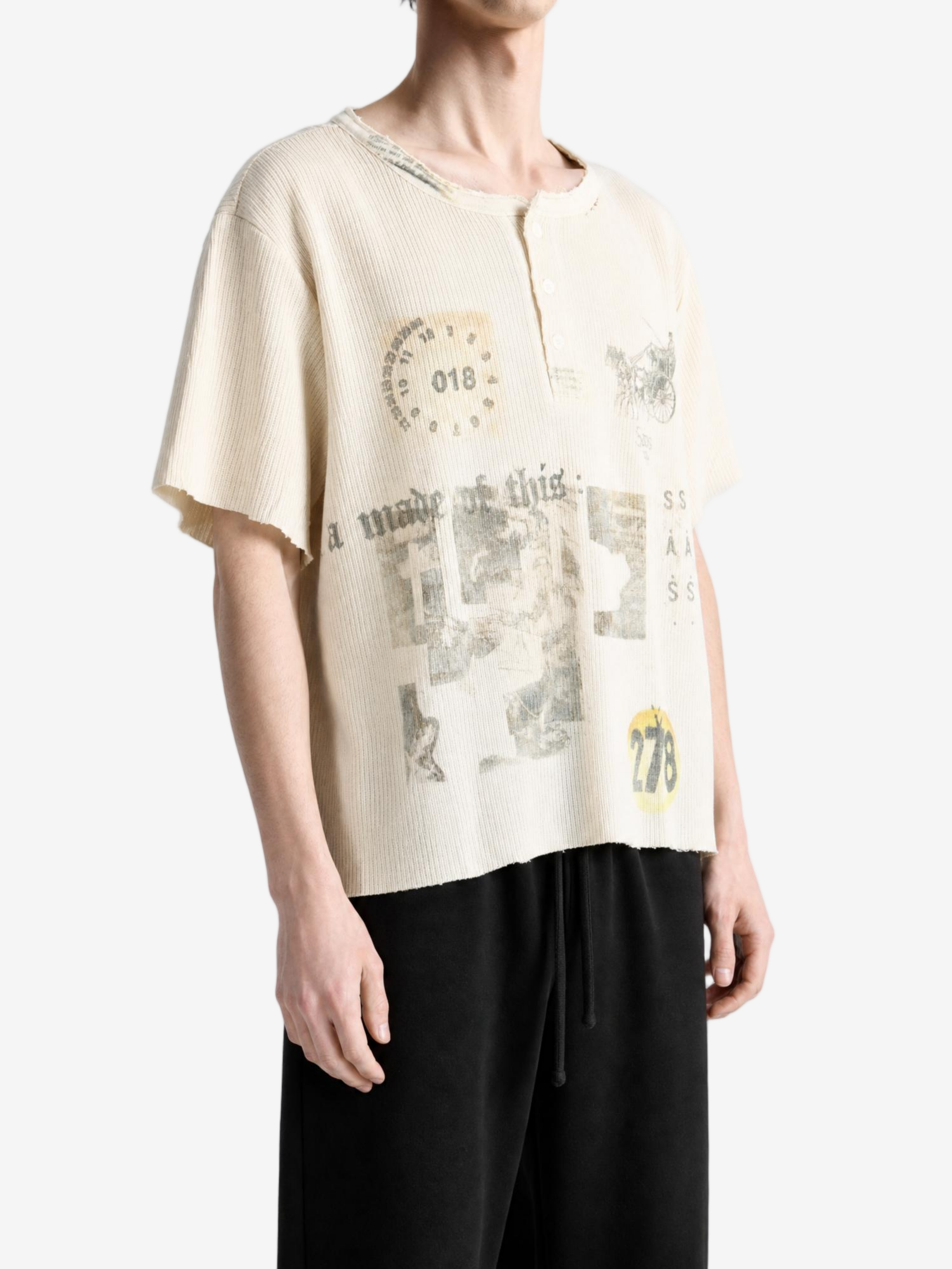 Tan t-shirt worn by a person, showing the t-shirt fit