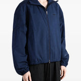 Navy jacket worn by a person, showing the jacket fit