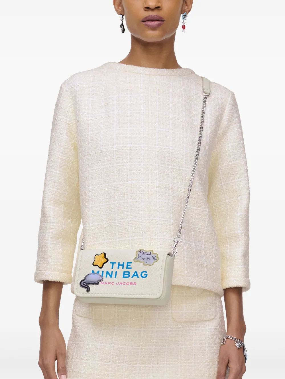 White bag worn by a person, showing the bag fit