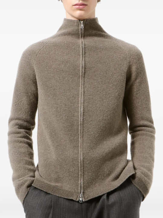 Brown knitwear worn by a person, showing the knitwear fit