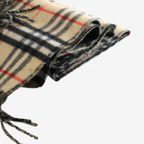 Close up of tan scarves, showing texture of the fabric