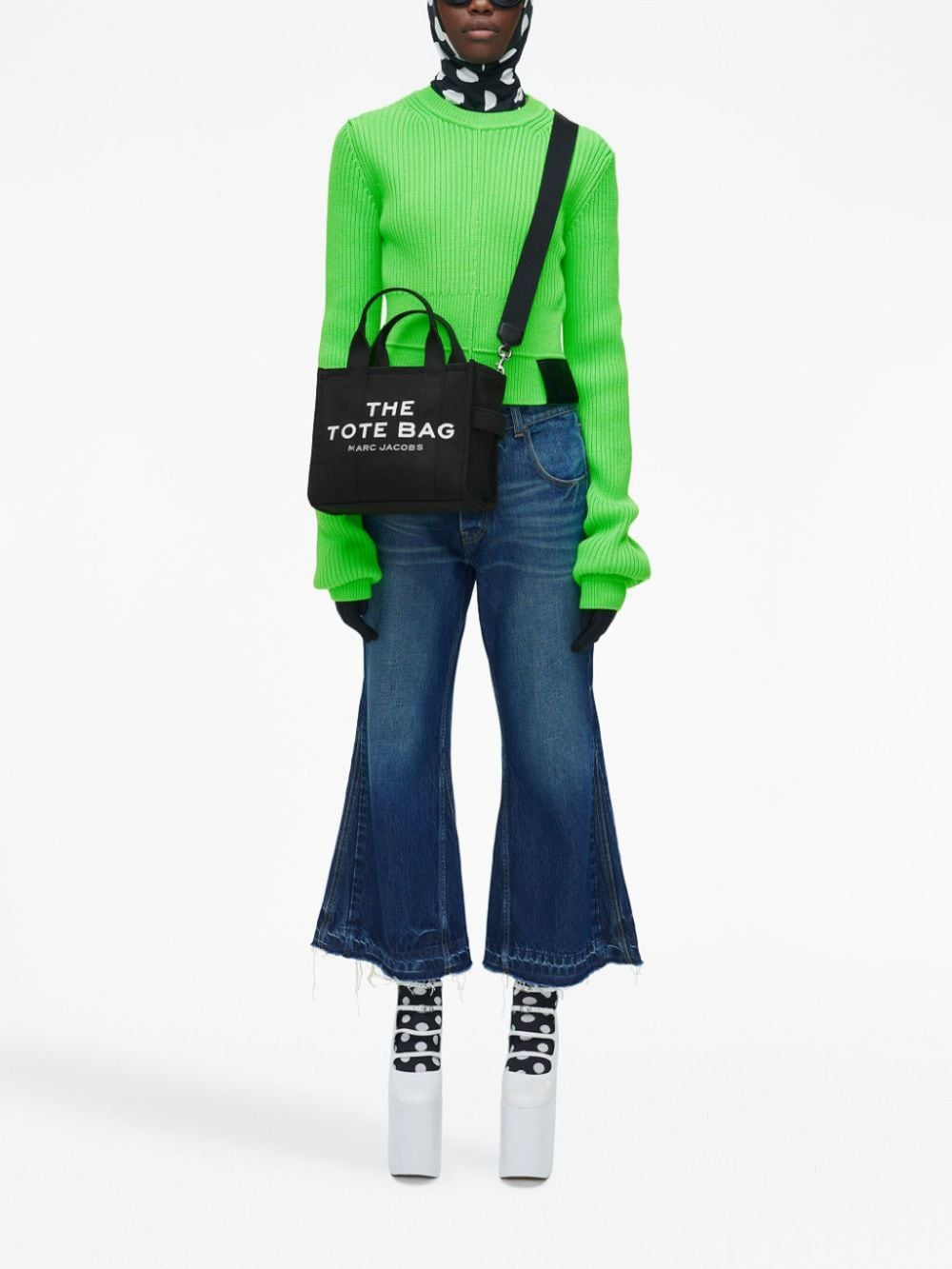 Black bag worn by a person, showing the bag's fit