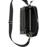 Close up of the black bag, showing texture of the leather fabric