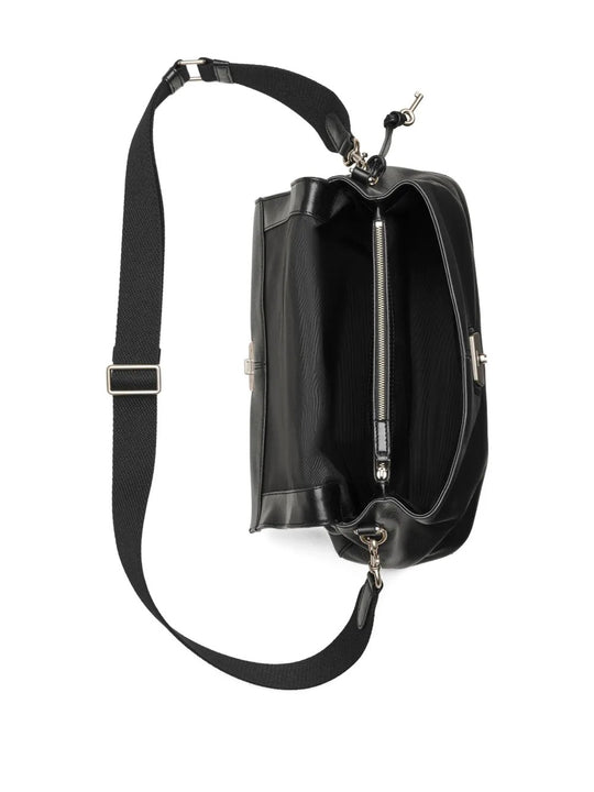 Close up of the black bag, showing texture of the leather fabric