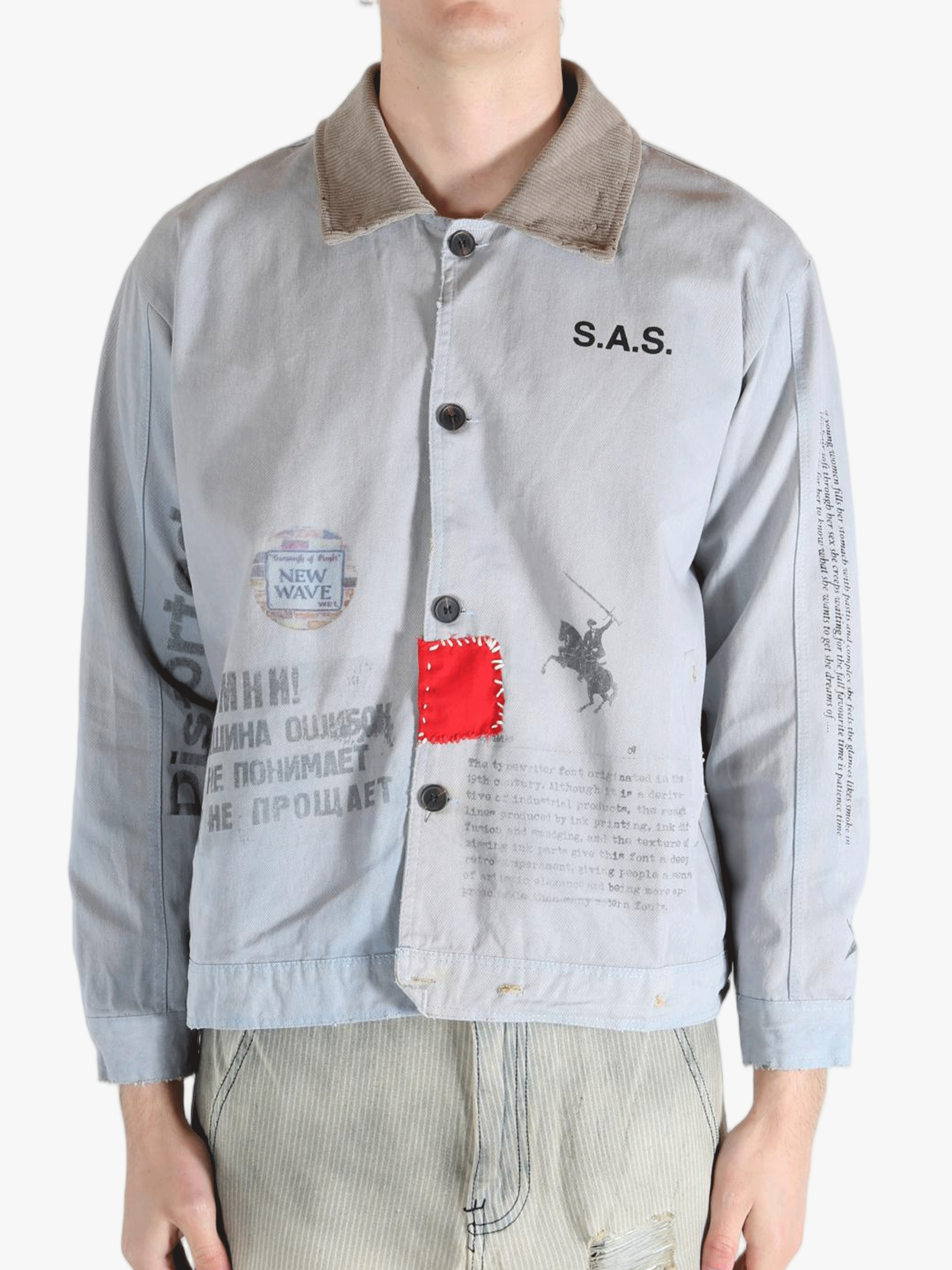 Grey jacket worn by a person, showing the jacket's fit
