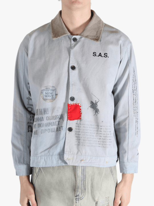 Grey jacket worn by a person, showing the jacket's fit