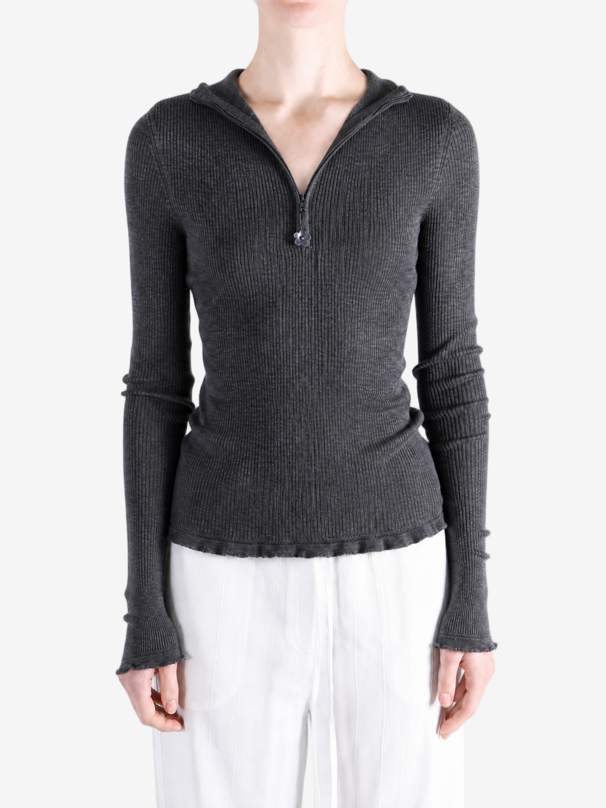 Grey hoodie worn by a person, showing the hoodie fit
