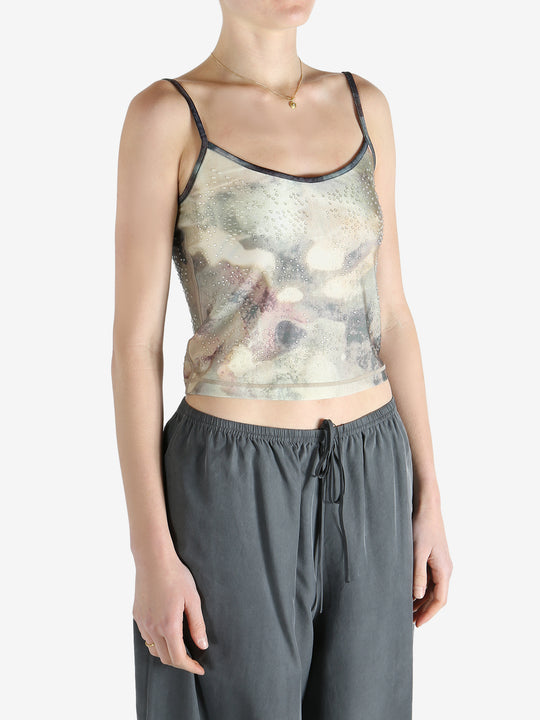 Grey top worn by a person, showing the fit