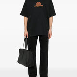 Black t-shirts, full body view