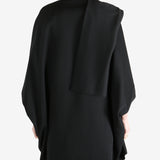 Black jackets worn by a person, showing the jackets fit