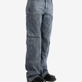 Grey pants worn by a person, showing the pants fit