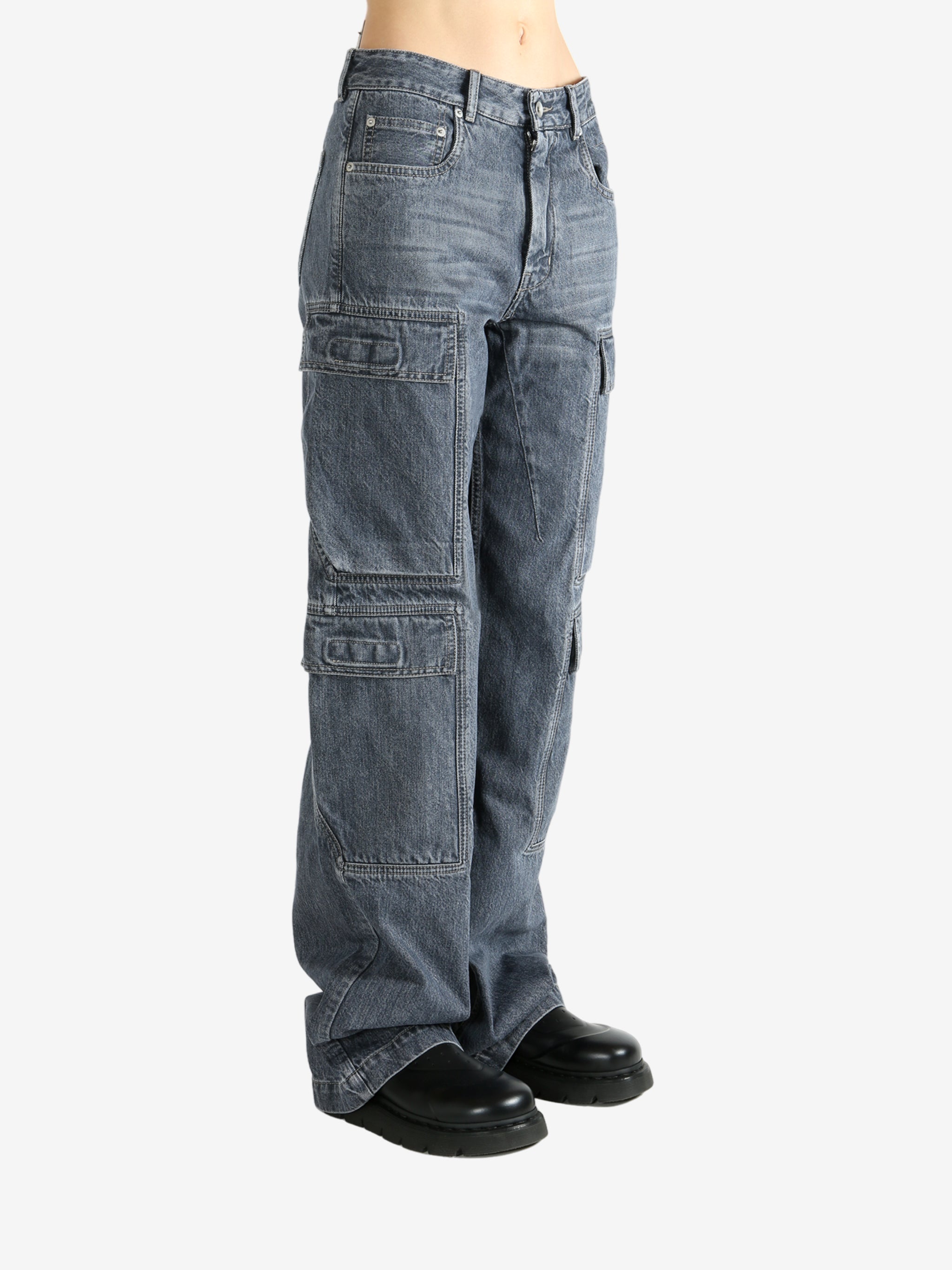 Grey pants worn by a person, showing the pants fit
