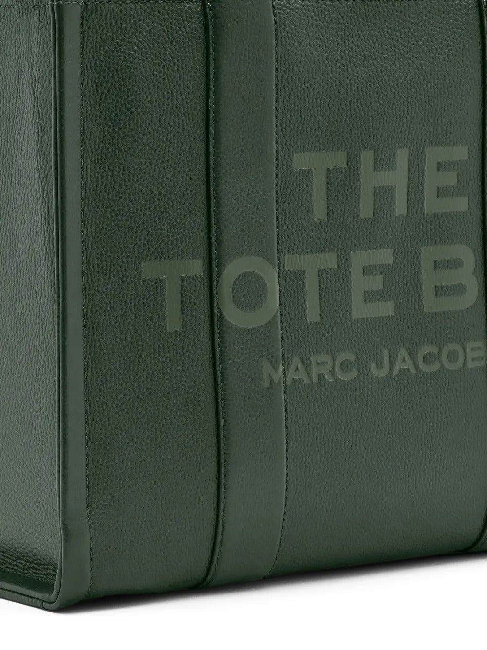 Close up of the green bag, showing texture of the leather fabric