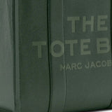 Close up of the green bag, showing texture of the leather fabric