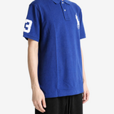 Blue top worn by a person, showing the top fit