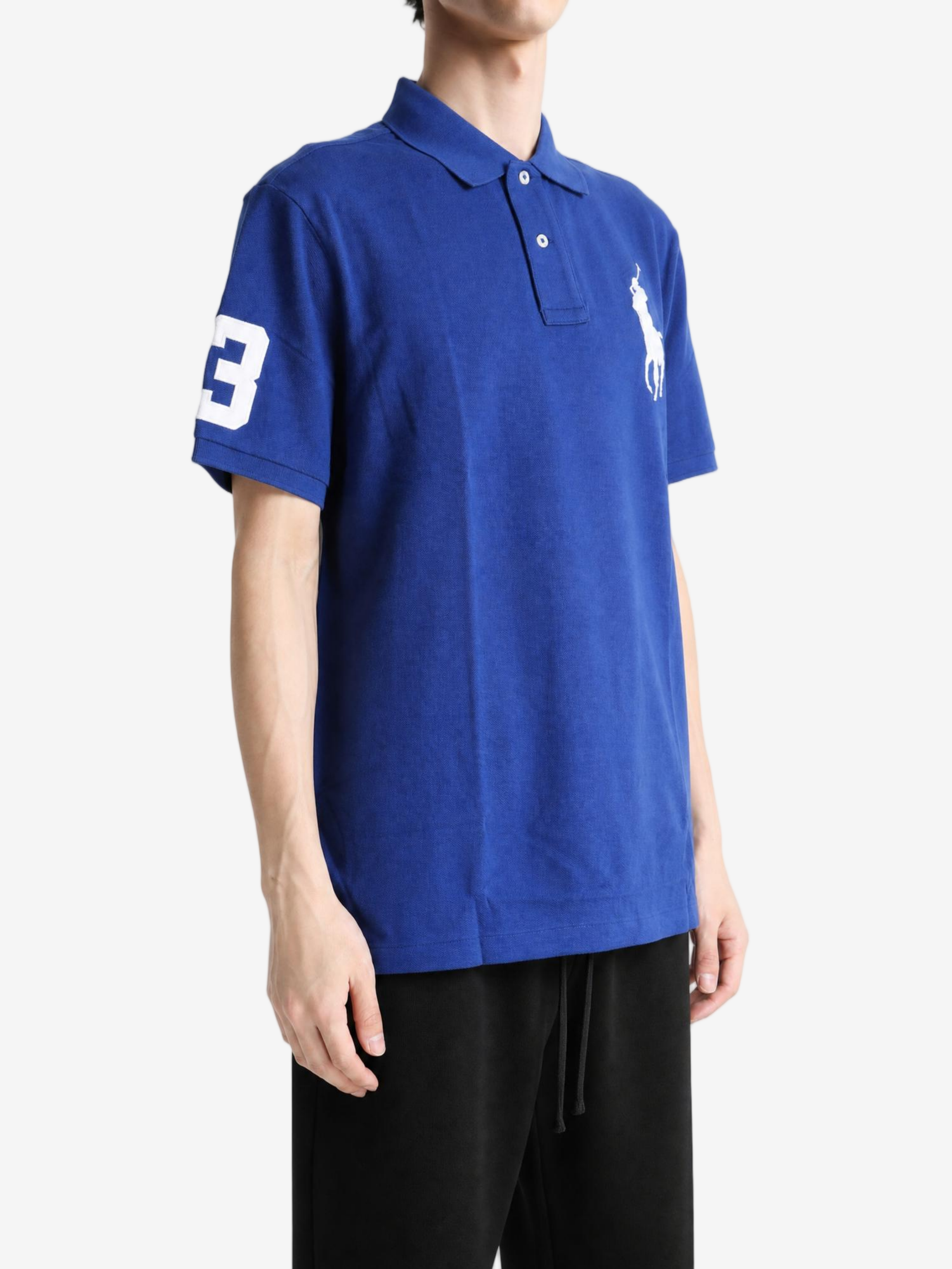 Blue top worn by a person, showing the top fit