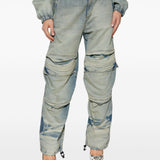 Blue pants worn by a person, showing the pants fit