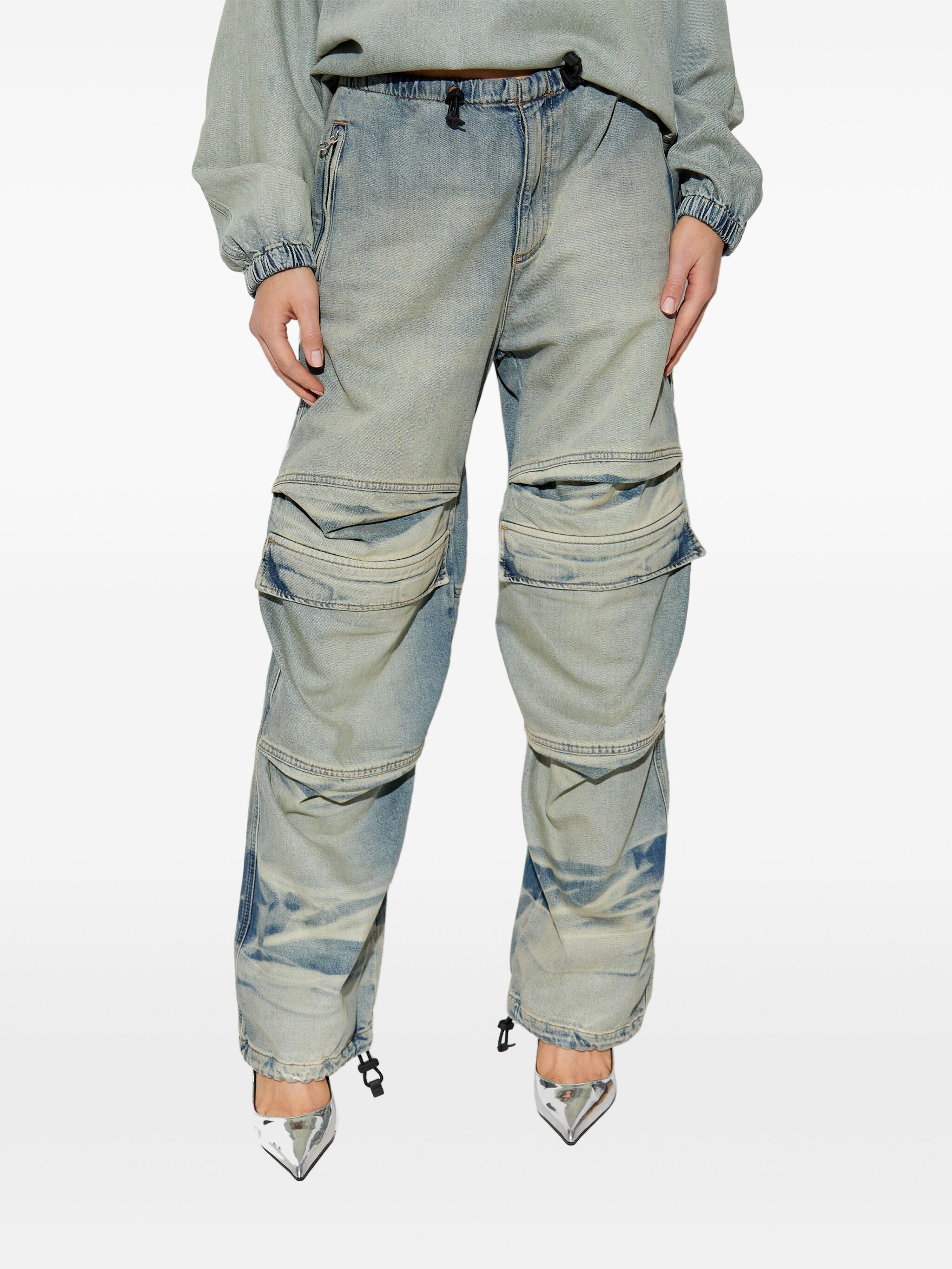 Blue pants worn by a person, showing the pants fit