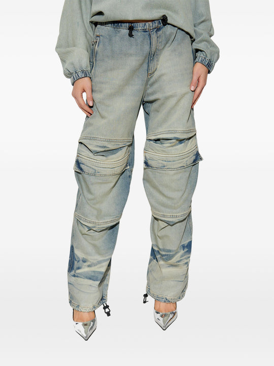 Blue pants worn by a person, showing the pants fit