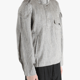 Grey jackets-coats worn by a person, showing the jackets-coats's fit