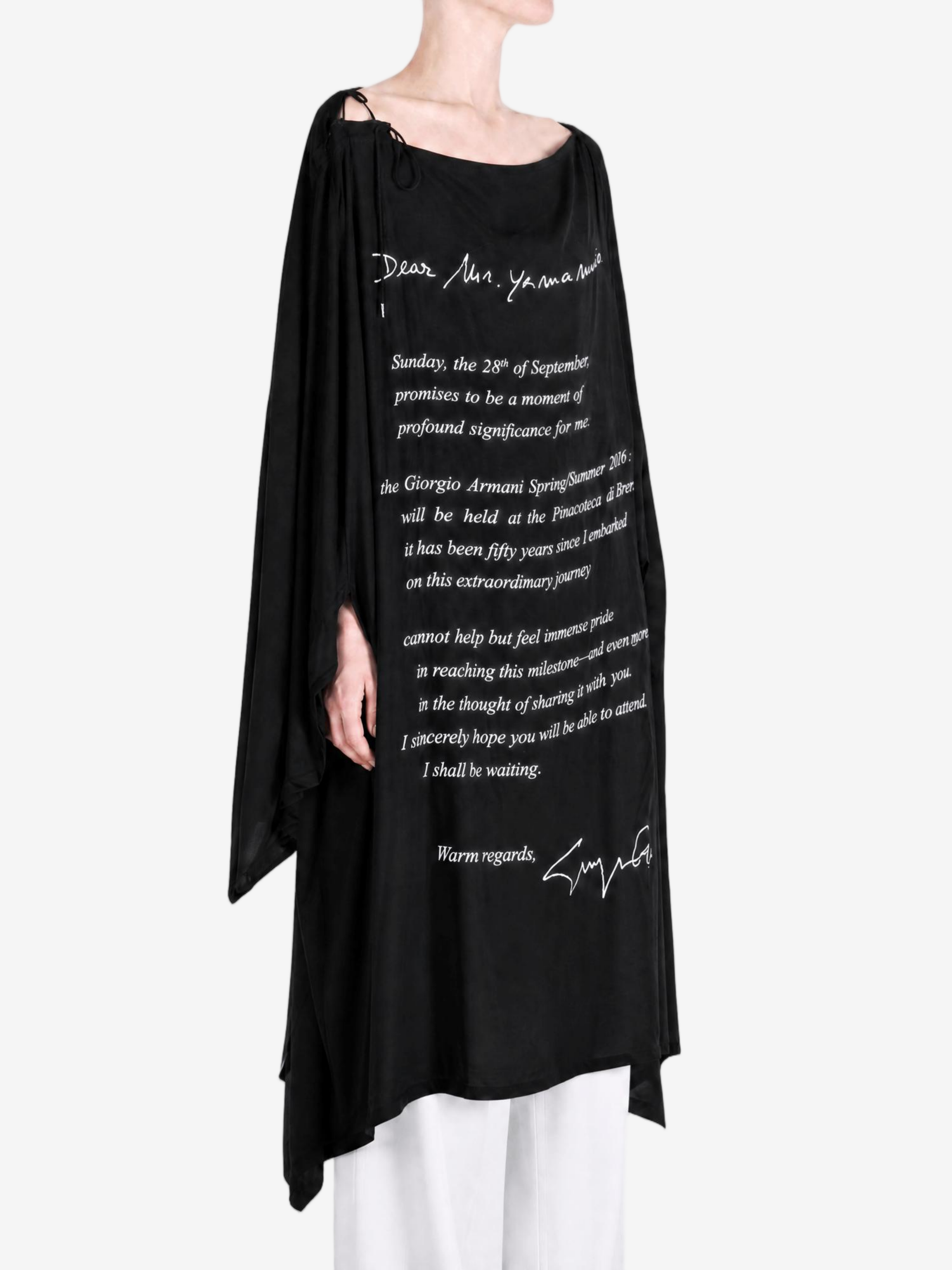 Black dress worn by a person, showing the dress fit