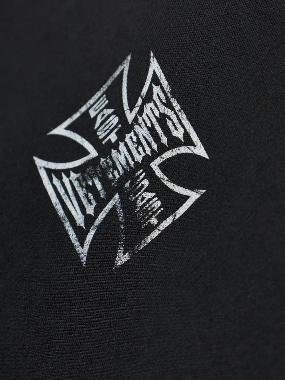 Close up of Black t-shirt, showing texture of the 100% cotton fabric