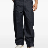 Blue pants worn by a person, showing the pants' fit