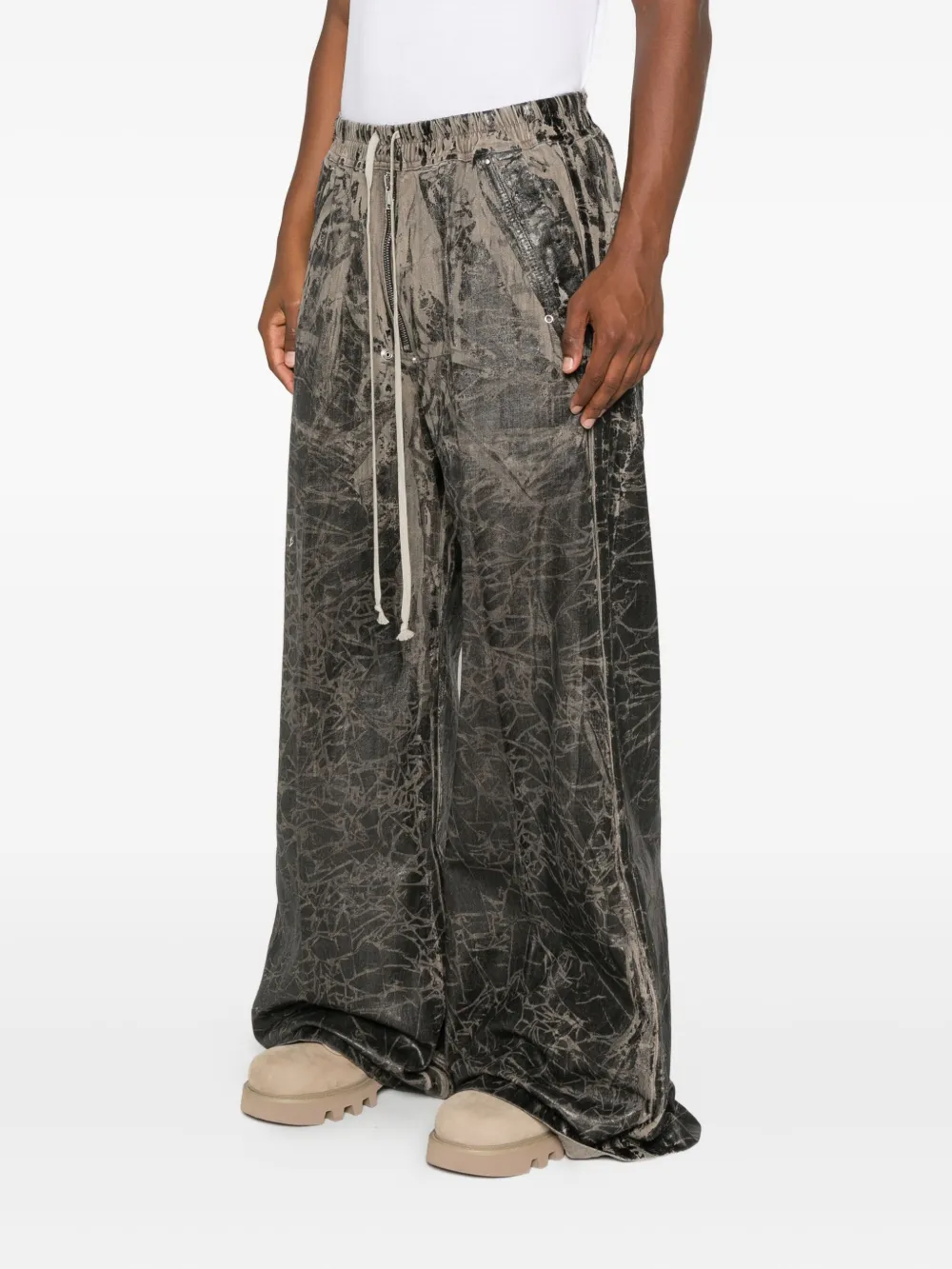 Grey pants worn by a person, showing the pants fit