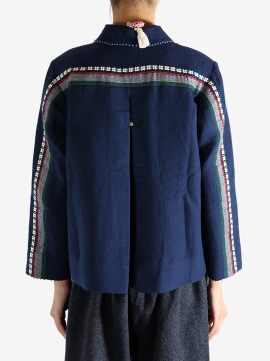 Navy jacket worn by a person, showing the jacket fit