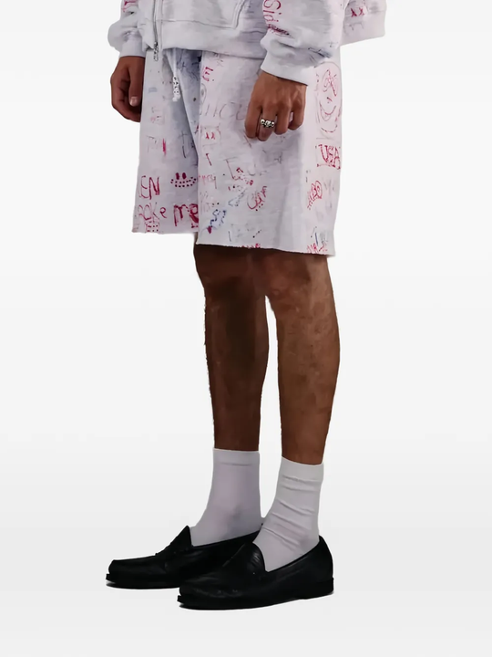 White shorts worn by a person, showing the shorts fit