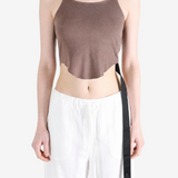 Brown top worn by a person, showing the top fit
