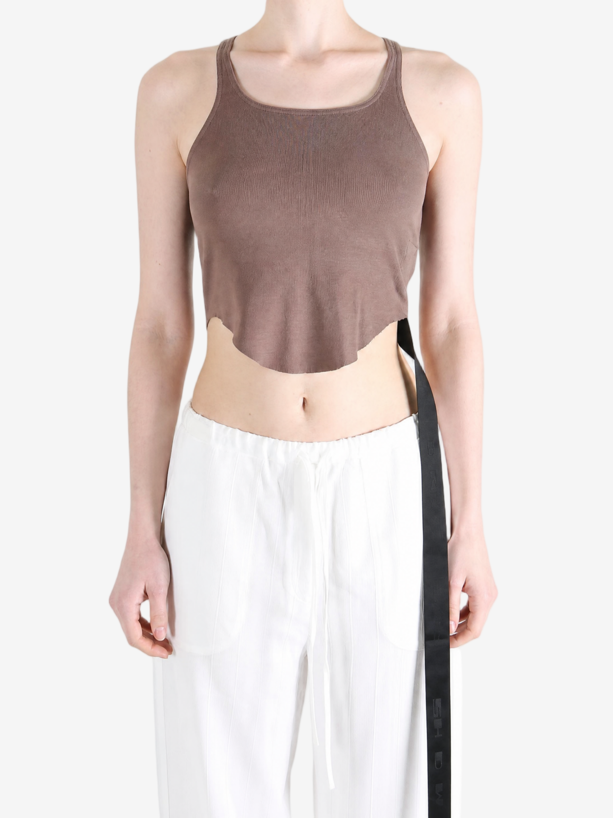 Brown top worn by a person, showing the top fit