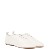 white flats, side view