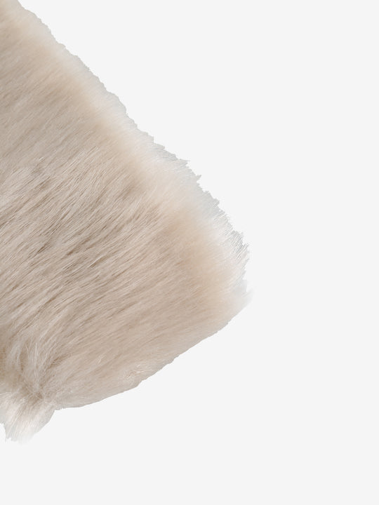 Close up of the white hairband, showing texture of the fur fabric
