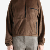 Brown shirts worn by a person, showing the shirts fit