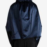 Navy jacket worn by a person, showing the jacket fit