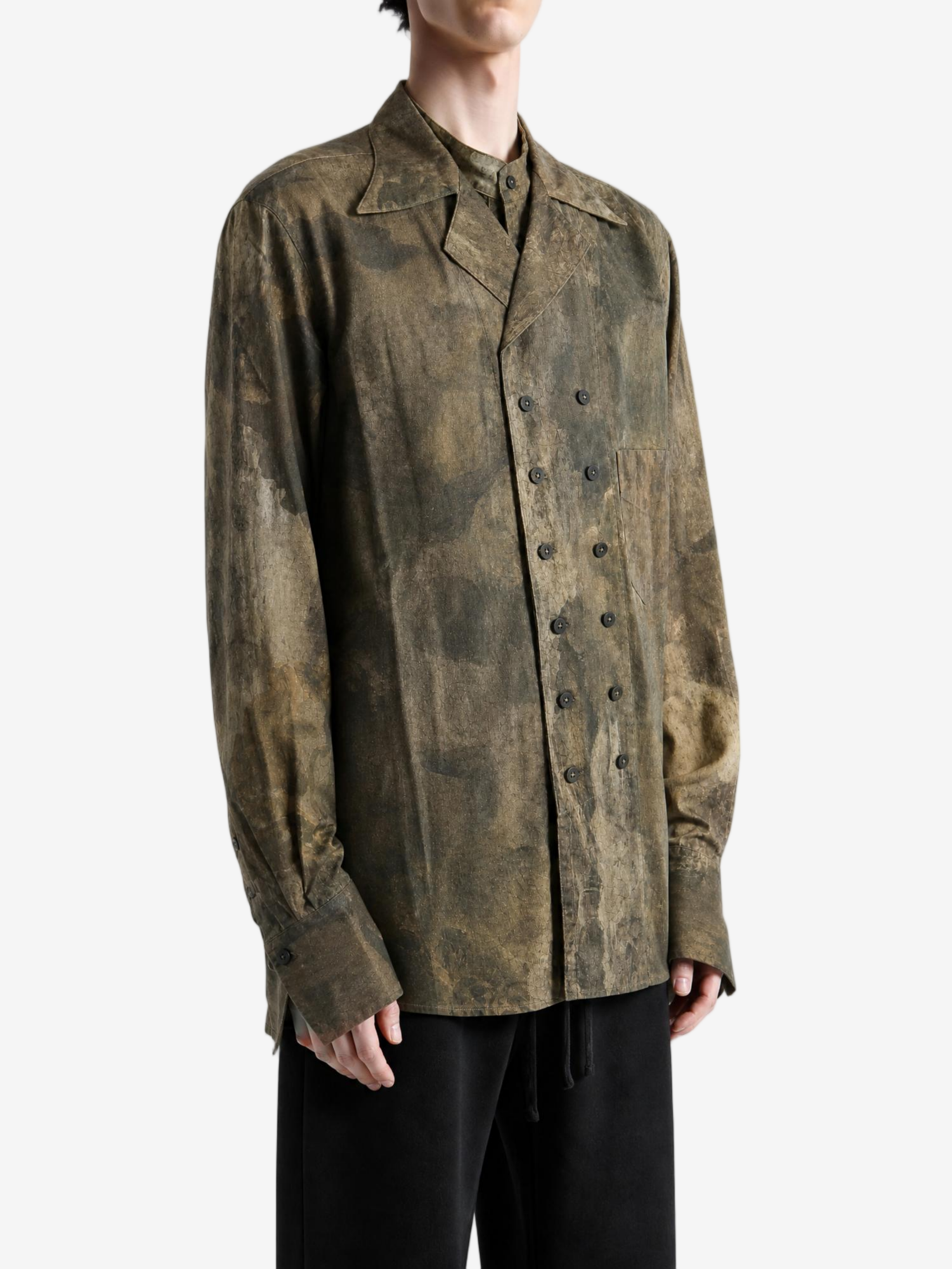 Brown shirt worn by a person, showing the shirt fit