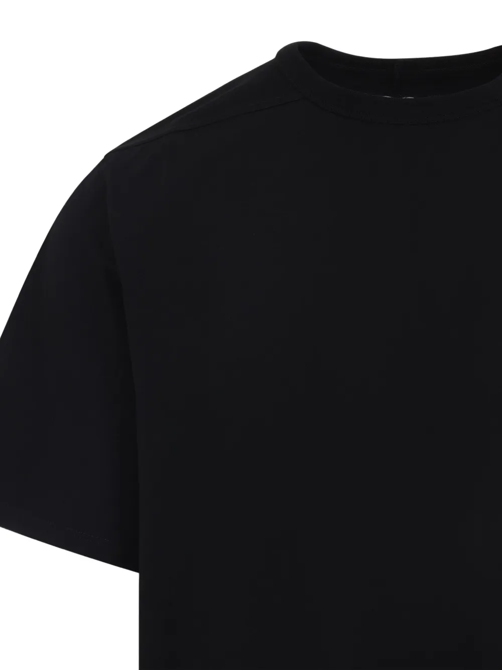 Close up of black t-shirt, showing texture of the cotton fabric