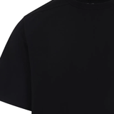 Close up of black t-shirt, showing texture of the cotton fabric