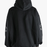 Black sweats-hoodies worn by a person, showing the fit