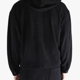 Black jackets worn by a person, showing the jackets fit