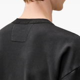 Black hoodie worn by a person, showing the hoodie fit
