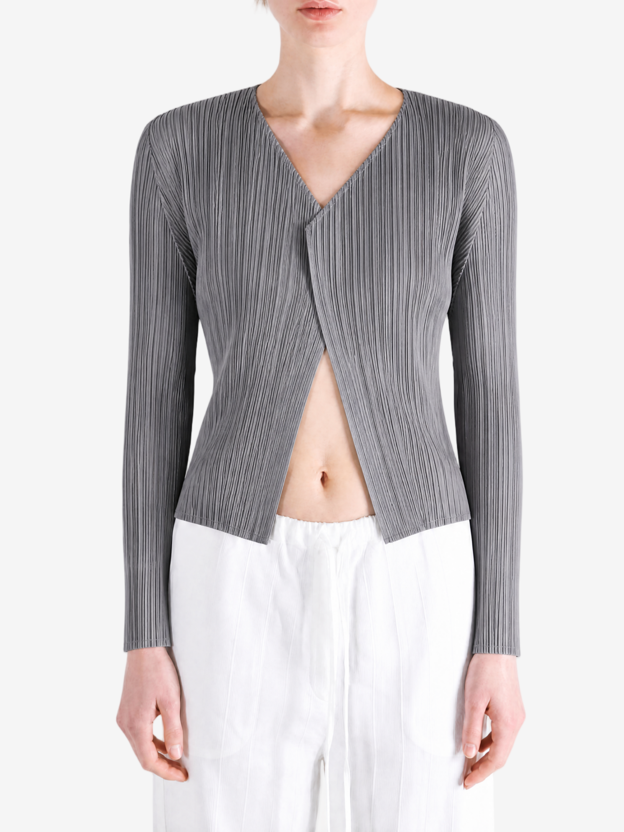 Grey knitwear worn by a person, showing the knitwear fit