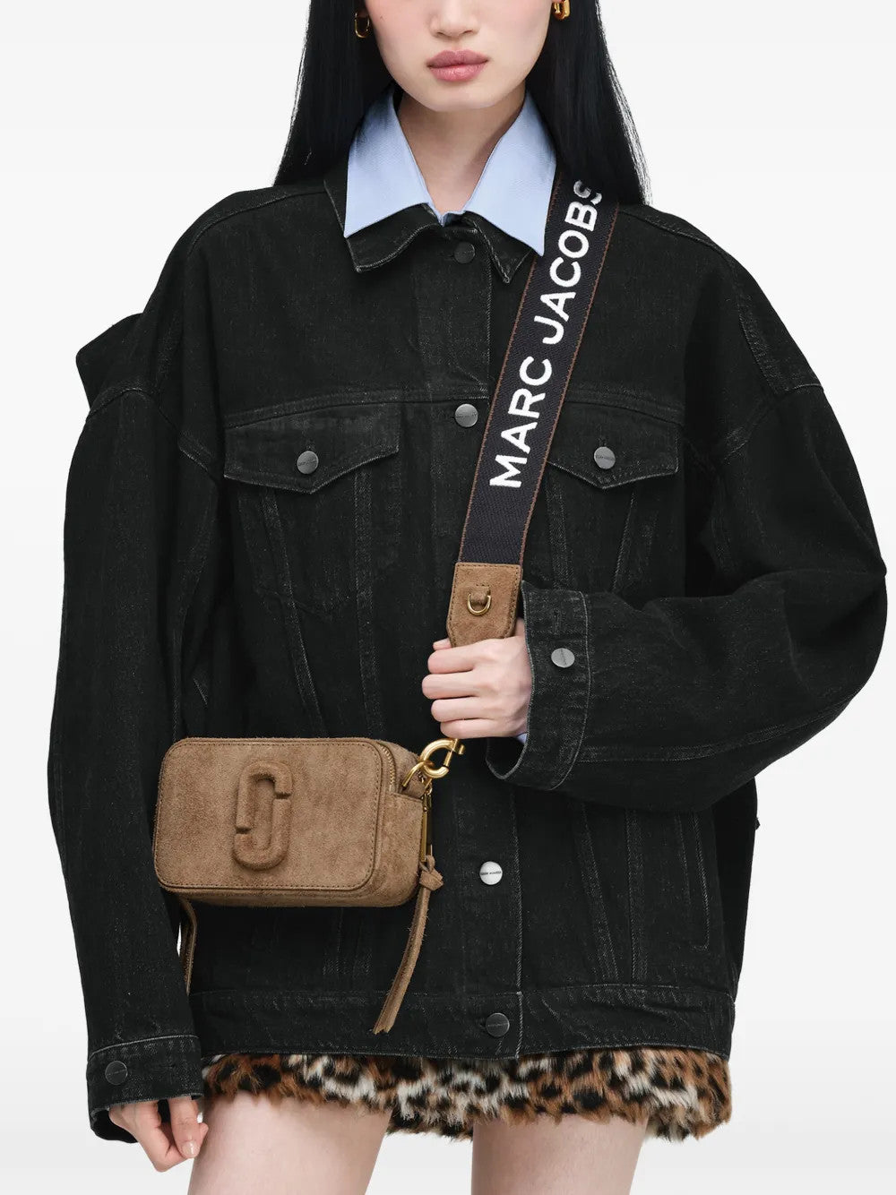 Tan bag worn by a person, showing the bag fit