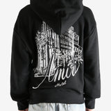 Black hoodie worn by a person, showing the hoodie fit