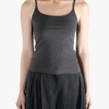 Grey top worn by a person, showing the top fit