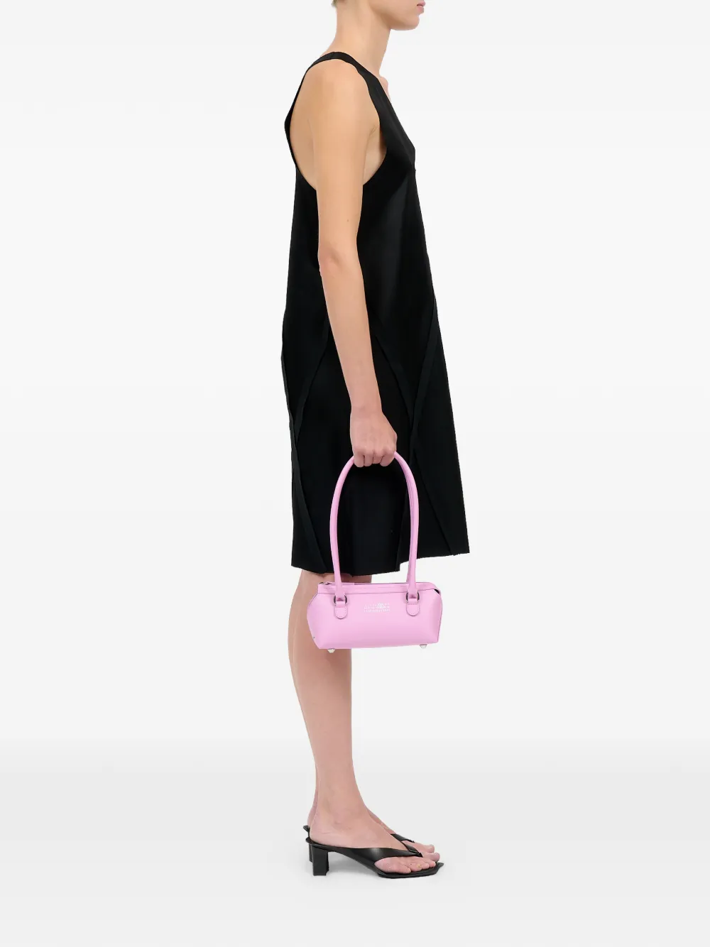 Pink bags worn by a person, showing the bags's fit