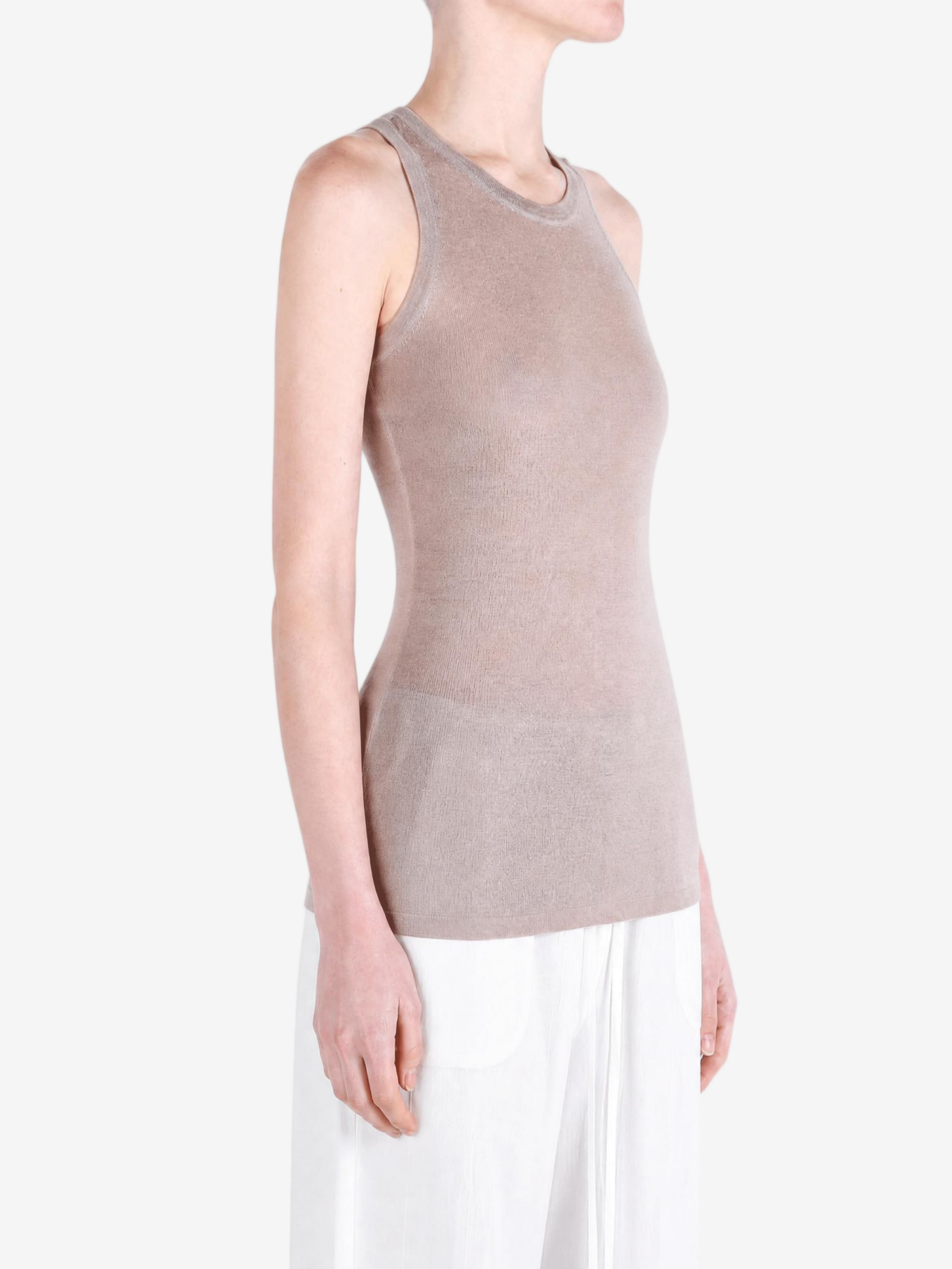 Tan top worn by a person, showing the top fit